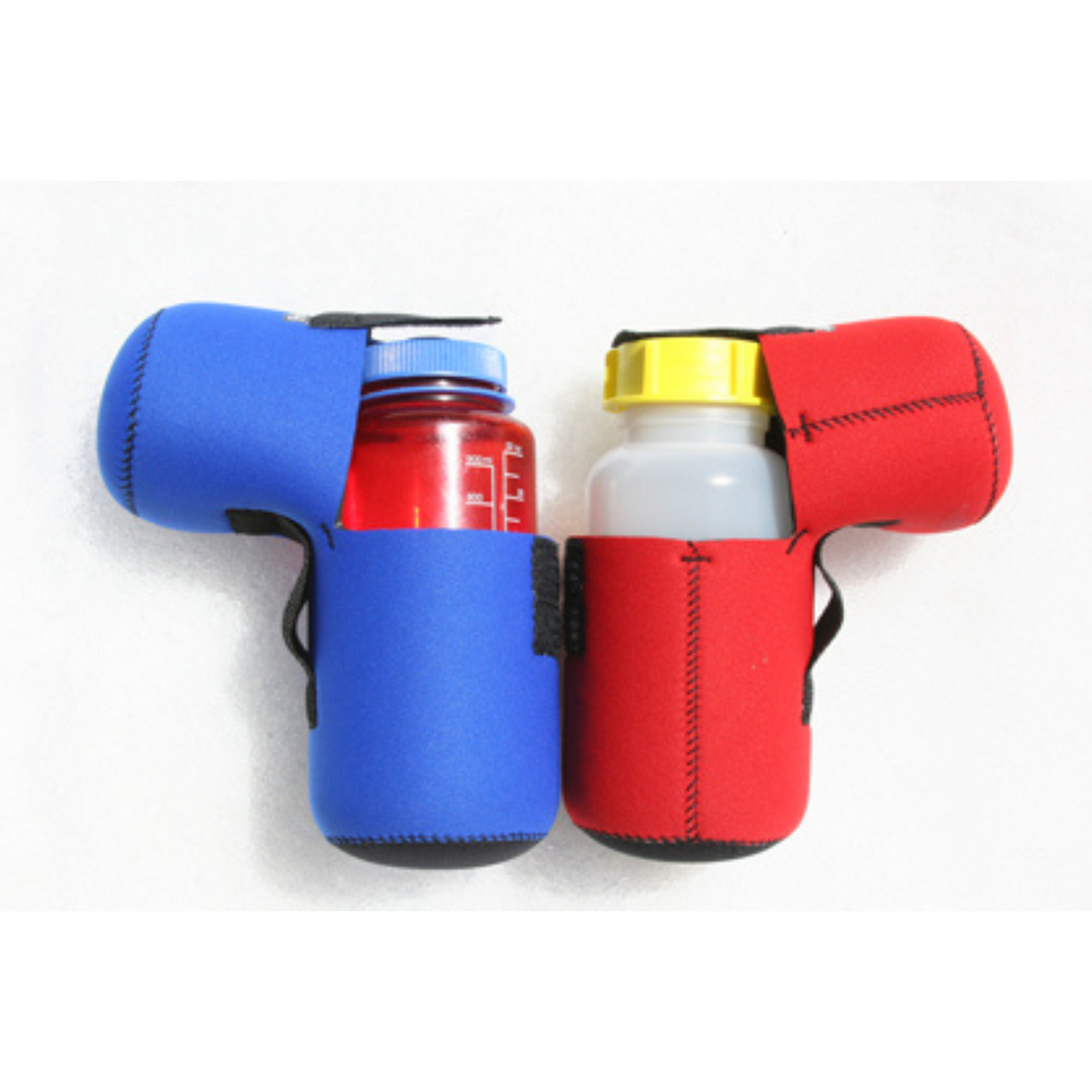 two Forty Below 1 L Insulated Bottle Covers one blue and one red, partially open holding Forty Below Cold Weather Water Bottle bottle and nalgene bottle on a white background.