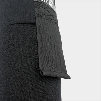 Forty Below 0.75 Liter Insulated Bottle Cover Black front view close up showing black velcro strap on a gray background