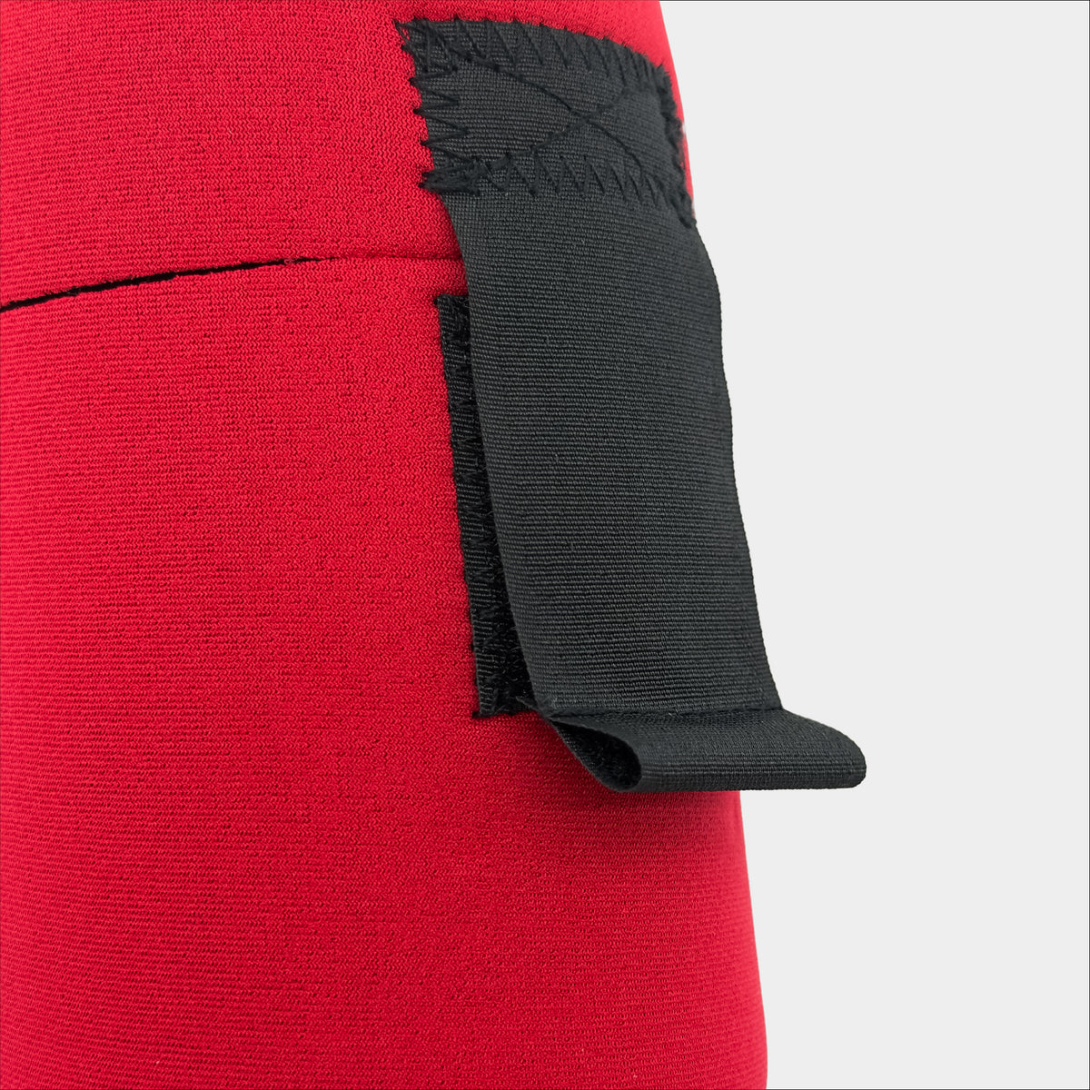 Forty Below 1.0 Liter Insulated Bottle Cover in Red front view showing black velcro strap with loop grab tab on a gray background