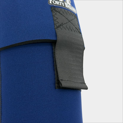 Forty Below 2qt Insulated Bottle Boot navy Blue close up front view showing front velcro strap on a gray background