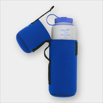 Forty Below Insulated Bottle Boot 48 oz blue side view partially open with 48 oz Nalgene bottle inside on a gray background