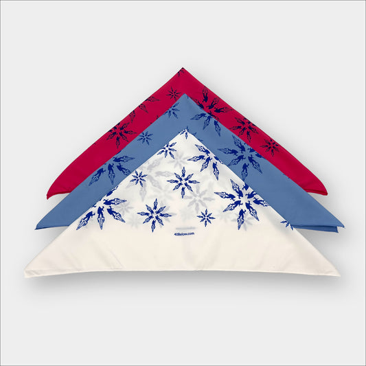 Forty Below synthetic Bandana in red, blue, and white folded into triangles on a white background