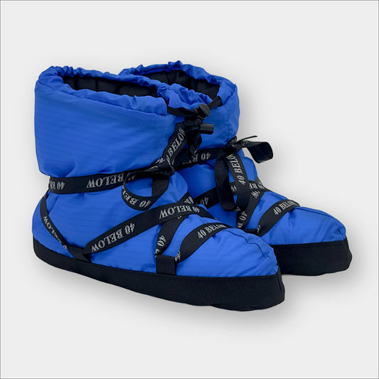 Forty Below Insulated Camp Bootie Side Thumbnail blue with black ribbon lacing on a grey background
