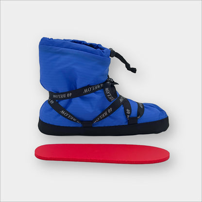 Forty Below Insulated Camp Bootie side profile, blue with black lacing, with a red foam insole below it on a white background
