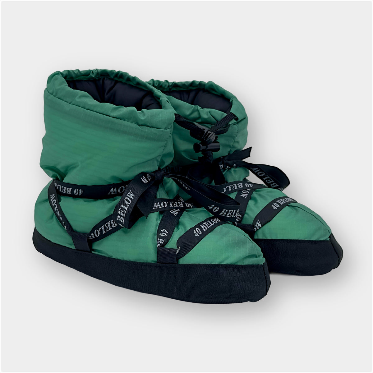 Forty Below Insulated Camp Bootie Side Thumbnail green with black ribbon lacing on a grey background