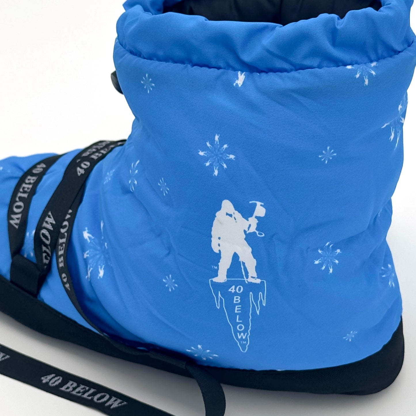 forty below insulated camp bootie snowflake blue and white pattern rear side view showing pattern graphic with black lacing on a white background