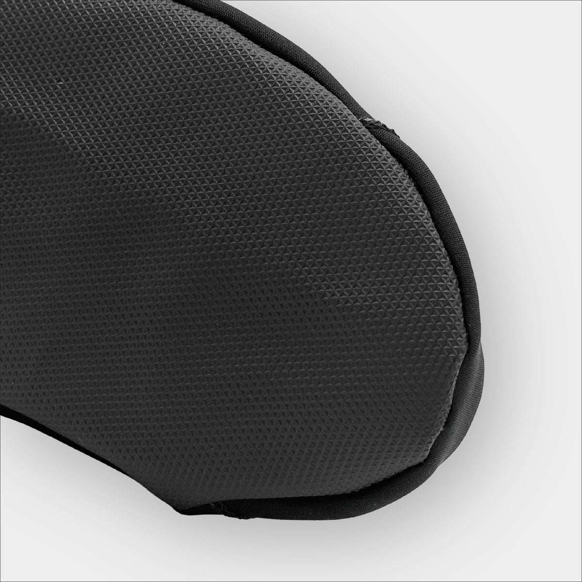 Insulated Forty Below Light Energy Shorty bottom view close up showing the black grippy sole on a gray background
