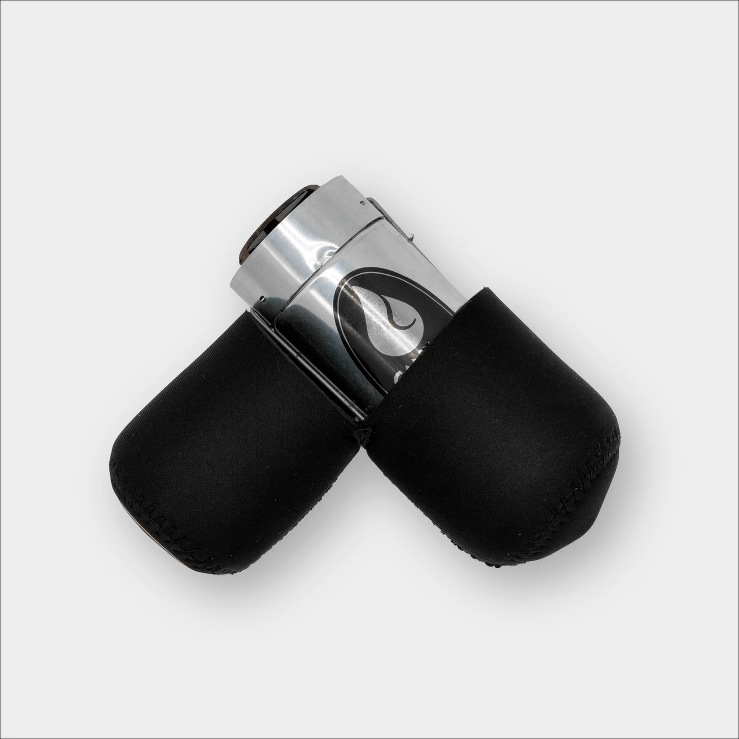 Forty Below Insulated lantern capsule black side view 90 degree open with a lantern on the inside on a plain grey background