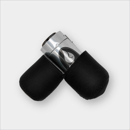 Forty Below Insulated lantern capsule black side view 90 degree open with a lantern on the inside on a plain grey background