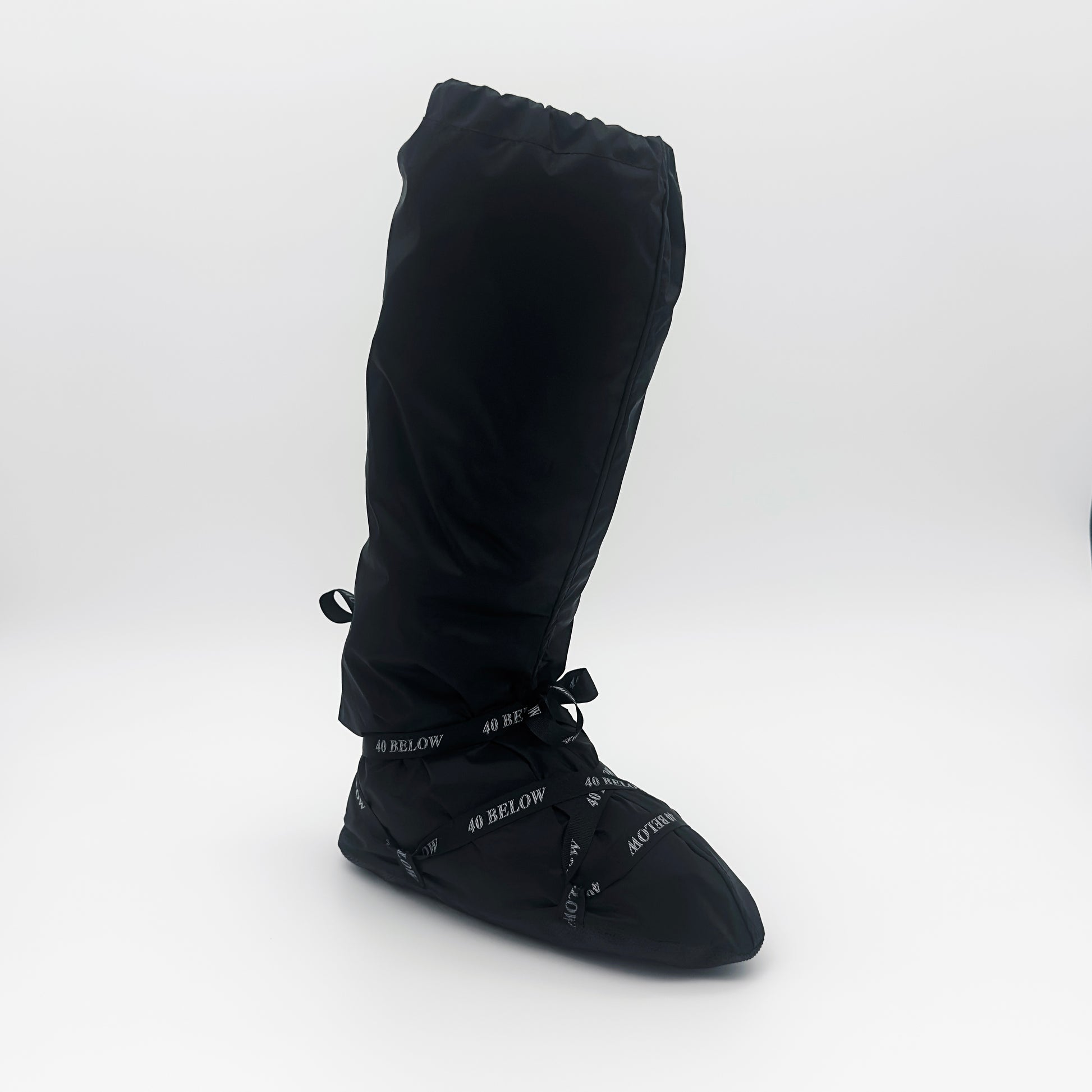 Forty Below Camp Bootie Overbootie cover 45 degree view showing front and side profile black with white background