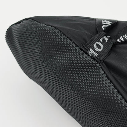 Forty Below Camp Bootie Overbootie close up on toe grippy sole material with white background