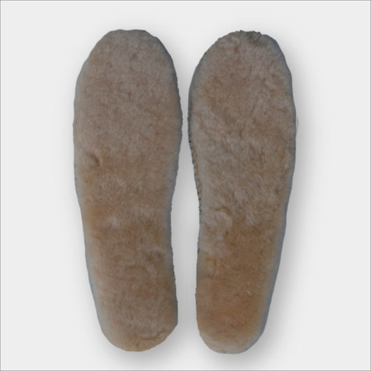 Forty Below Sheepskin Insoles top down soft fluffy tan top on a plain grey background