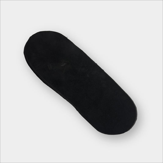 Forty Below bootie bootie insole single black insole shown diagonally on a plain light gray background.