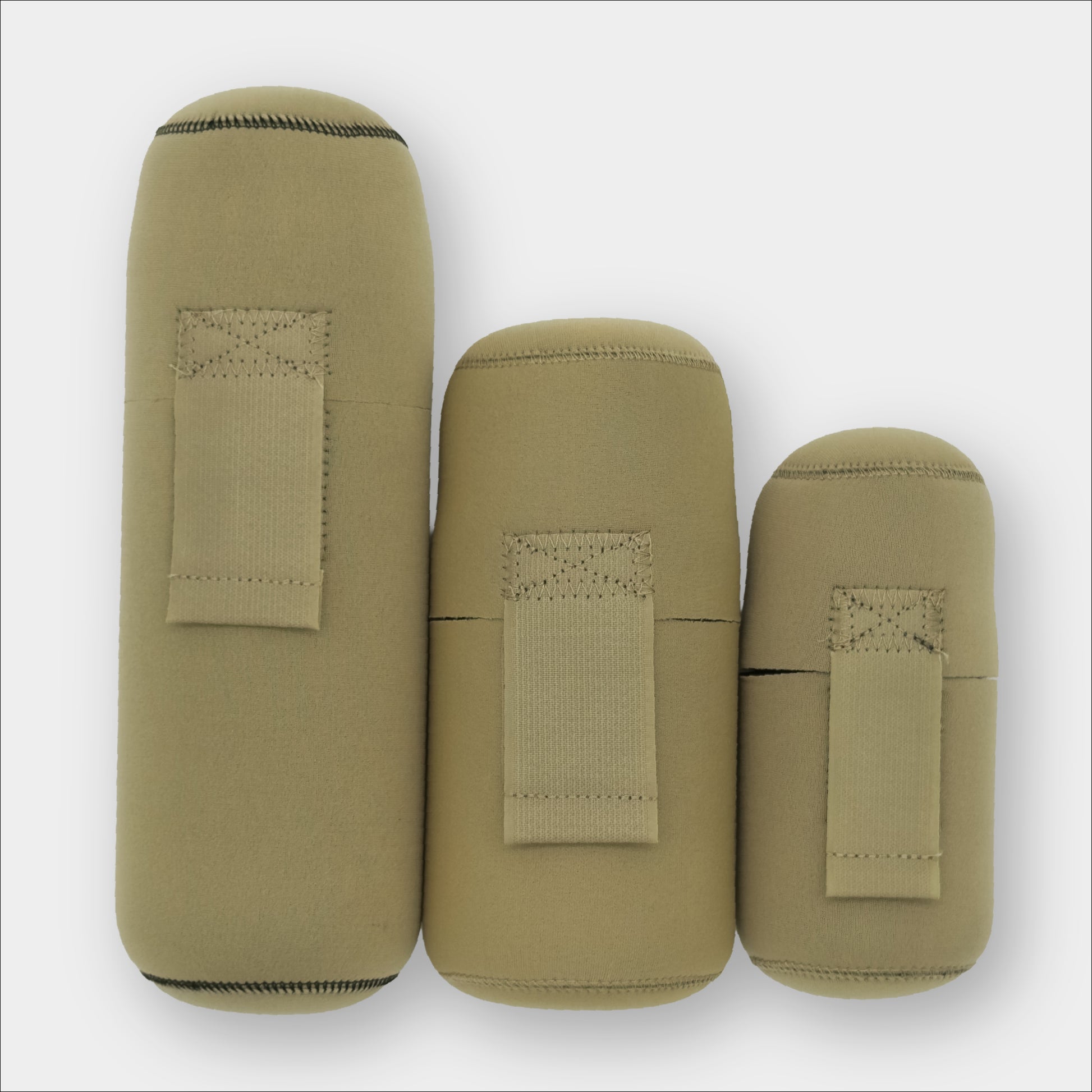 Forty Below Insulated Bottle Boot 48 oz, 1.0 Liter and 0.5 Liter tan color all next to each other front facing with no logo on a gray background
