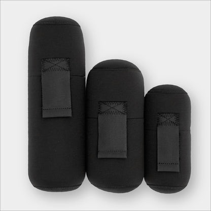 Forty Below Insulated Bottle Boot 48 oz, 1.0 Liter and 0.5 Liter black color all next to each other front facing with no logo on a gray background
