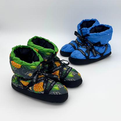 forty below insulated camp bootie pineapple and snowflake patterned thumbnail next to eachother