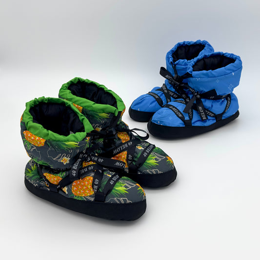 forty below insulated camp bootie pineapple and snowflake patterned thumbnail next to eachother