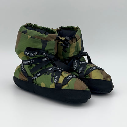 Forty Below  insulated camp bootie thumbnail woodland camo pattern with black lacing on a white background