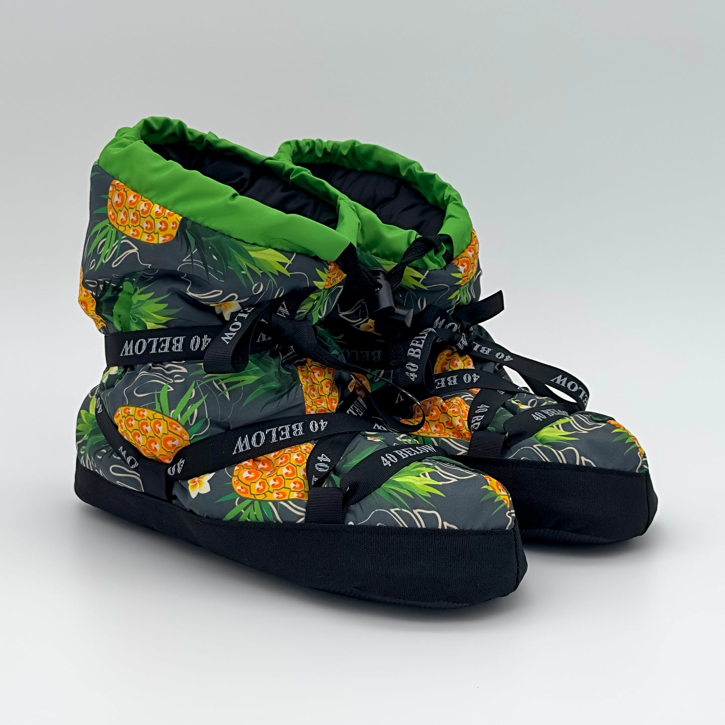forty below insulated camp bootie pineapple green pattern with black lacing on a white background