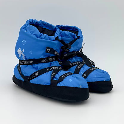 forty below insulated camp bootie snowflake blue and white pattern with black lacing on a white background