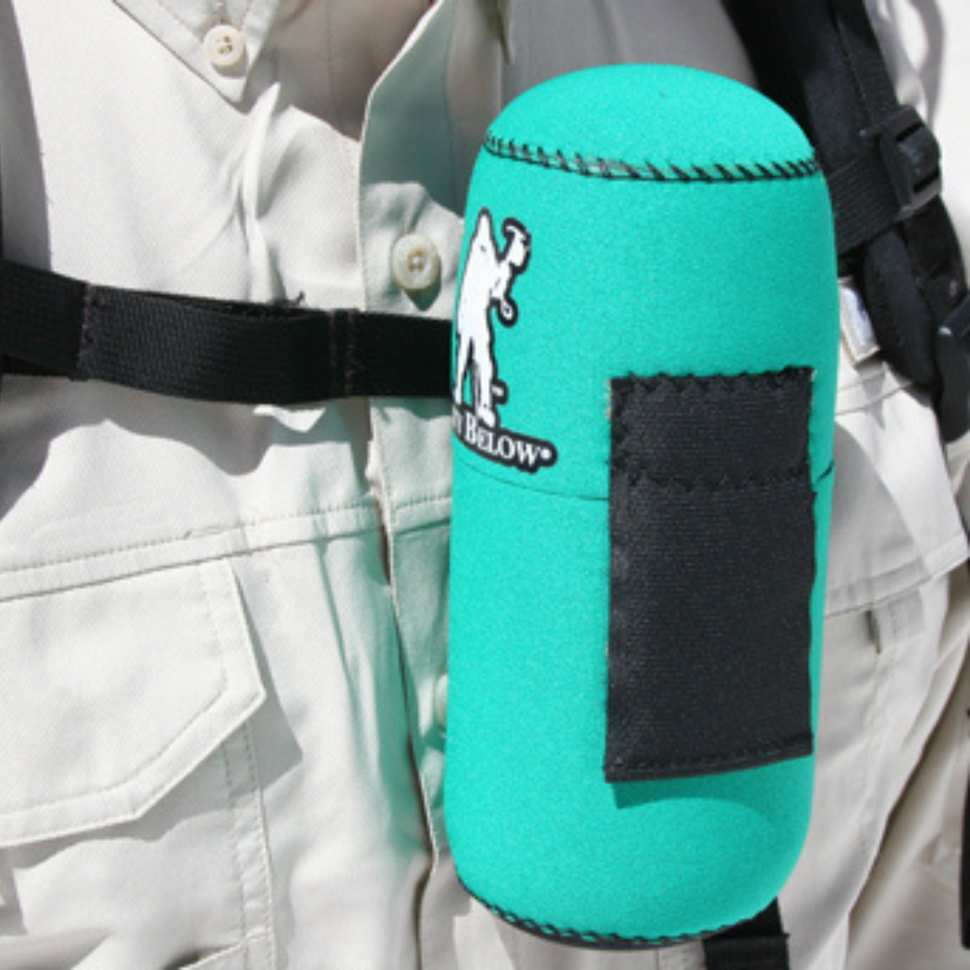 Forty Below 0.5 L Insulated Bottle Cover Green side view of cover mounted to sternum strap of backpack